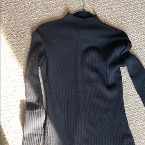 Black Ribbed Turtleneck Sweater
